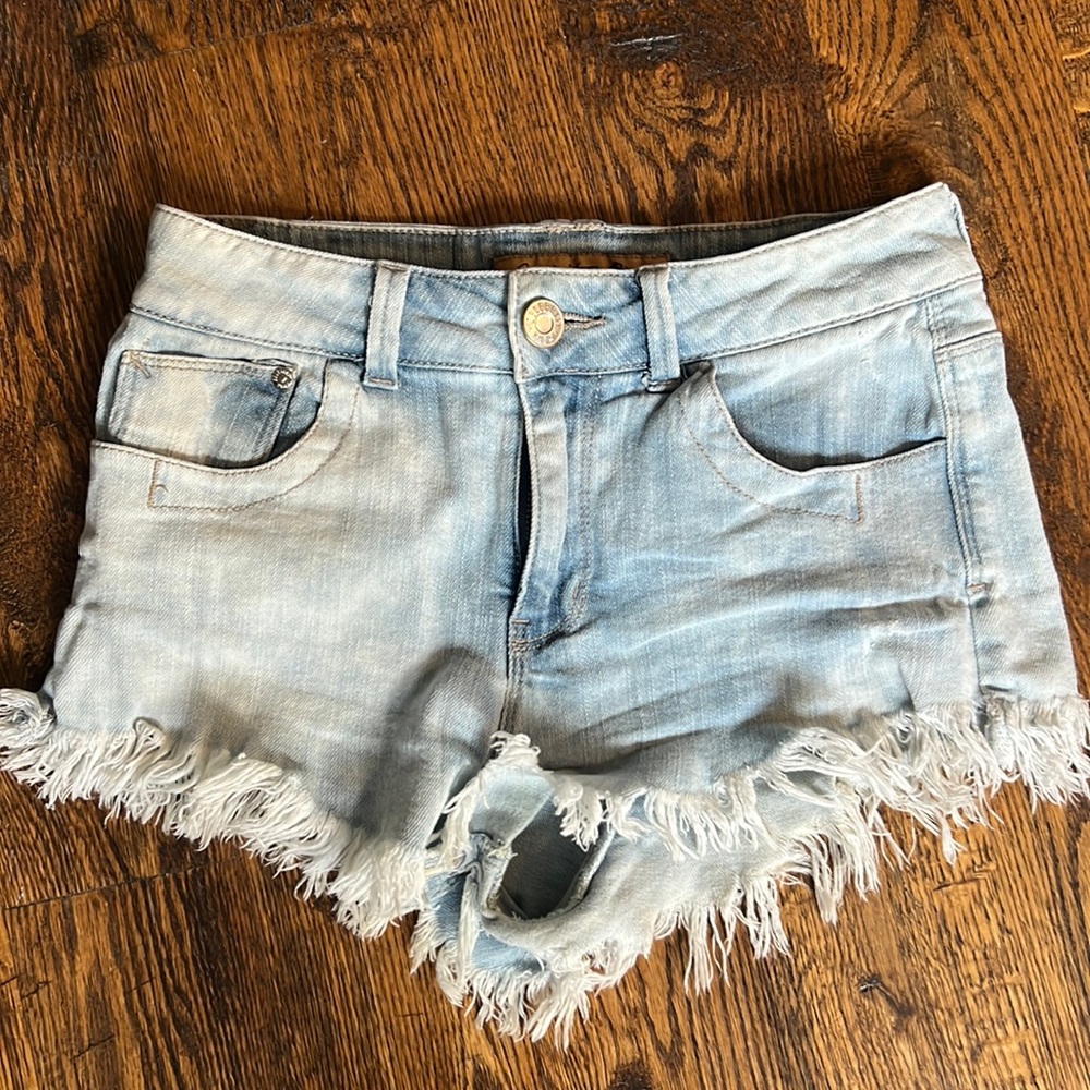 Celebrity Pink Blue denim fringe shorts
